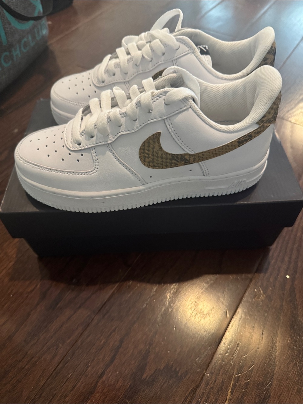 Brand new Nike Kids White Sneakers with Brown Swoosh Accent